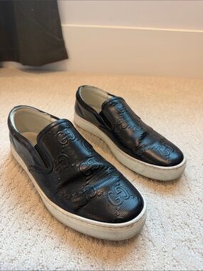 Gucci Black Embossed Leather Slip-On Sneakers